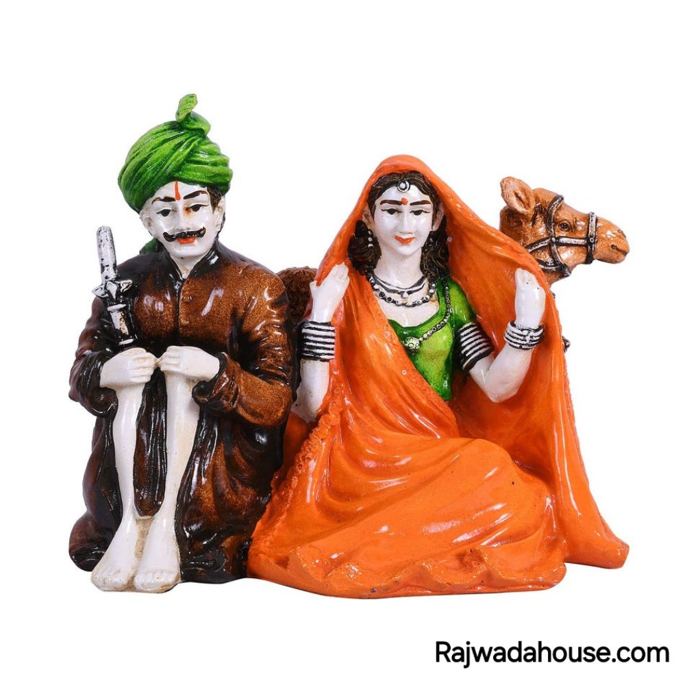 Rajasthani Couple Sitting Together With Camel